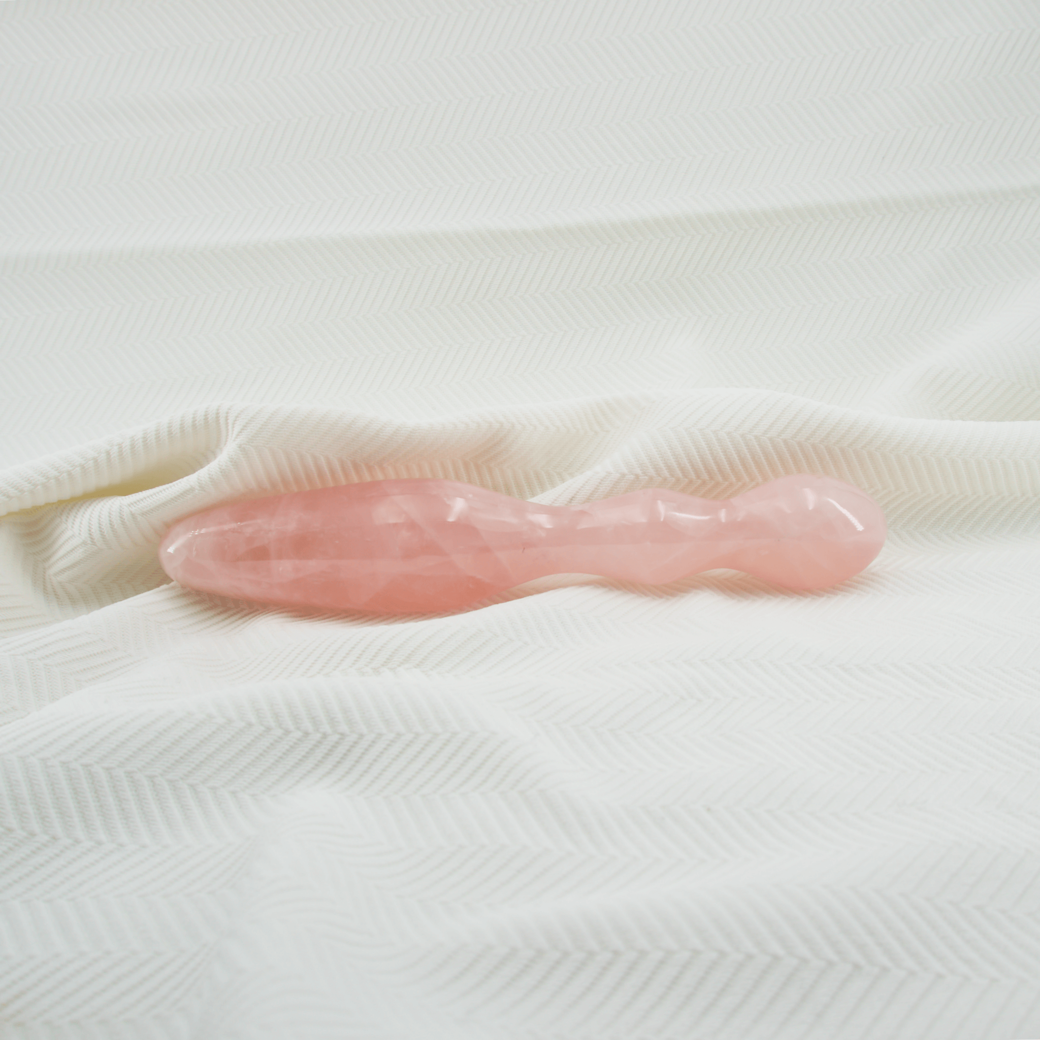 CrystalThrill Curved, Double End, Bulbous, Tapered Rose Quartz / 9" Ellure