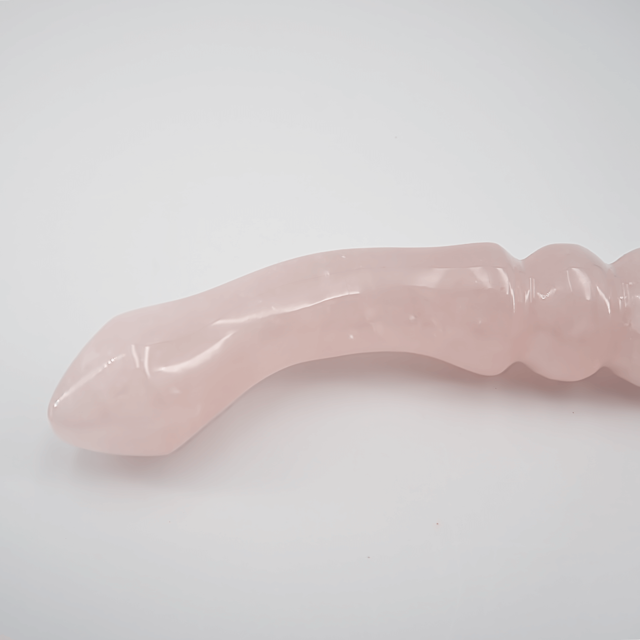 CrystalThrill Curved, Double End, Ribbed,Tapered Rose Quartz / 7" Curvona